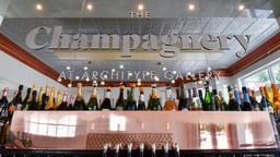The Champagnery reopens after year-long closure - Louisville Business First