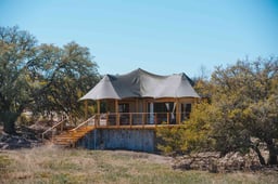 This Texas Glamping Property Near Austin Has Safari Tents With Wrap-around Decks and Is Next to a State Park