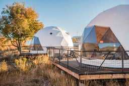 This New Colorado Eco Hotel Has 14 Geodesic Domes With Private Wraparound Decks and Hammocks — and It's Near the World's Deepest Hot Spring