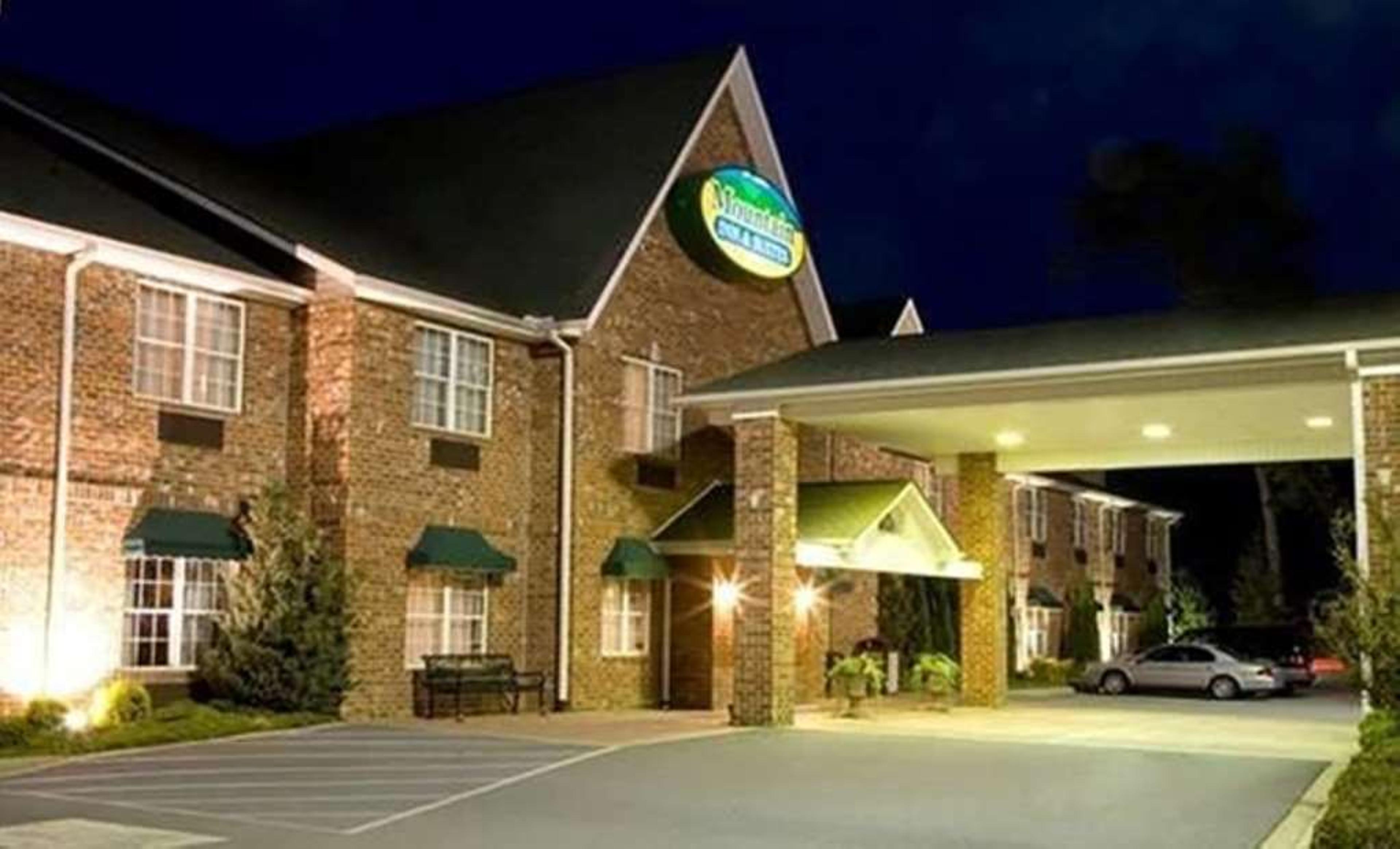 MOUNTAIN INN AND SUITES