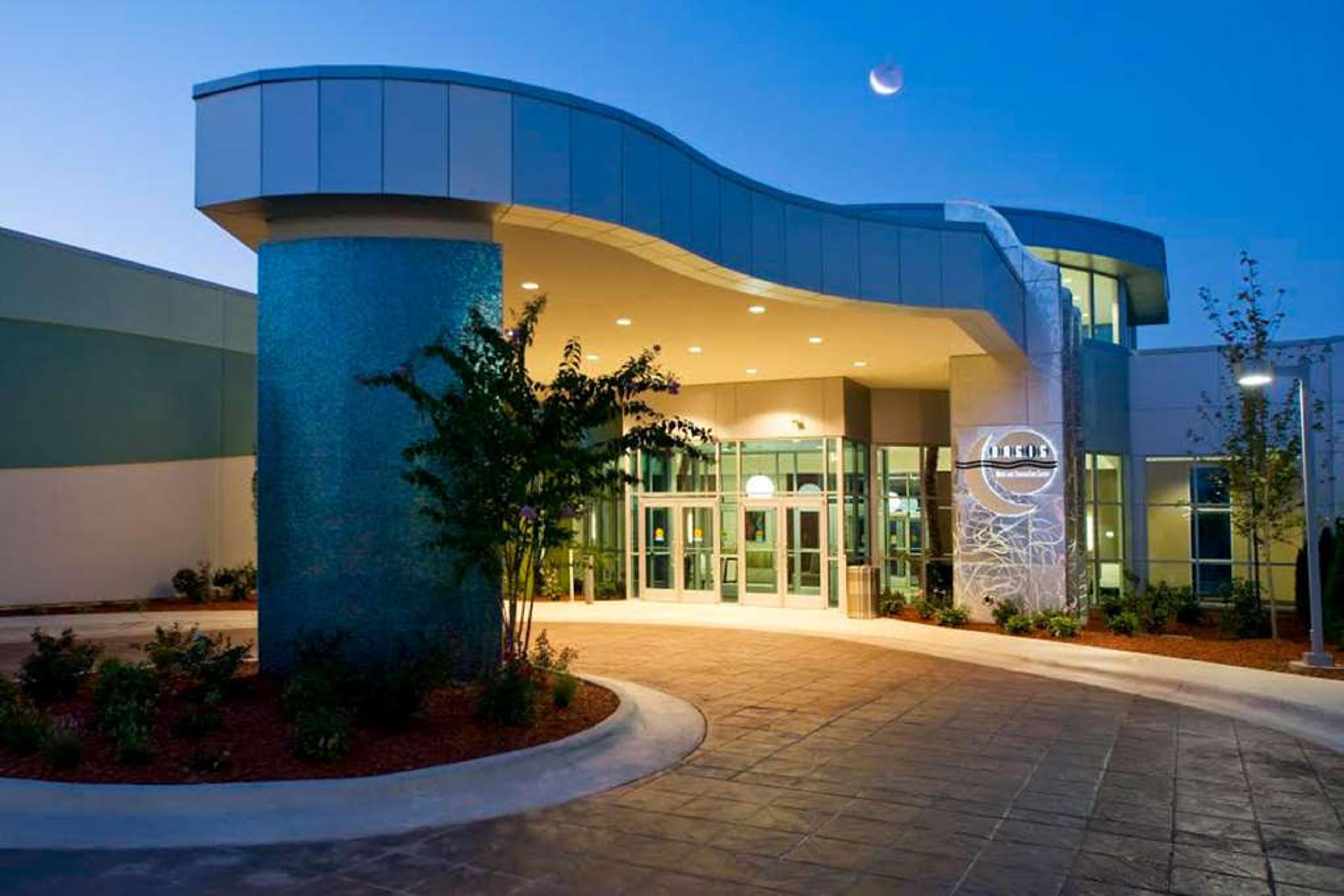 OASIS HOTEL AND CONV CENTER AN ASCE