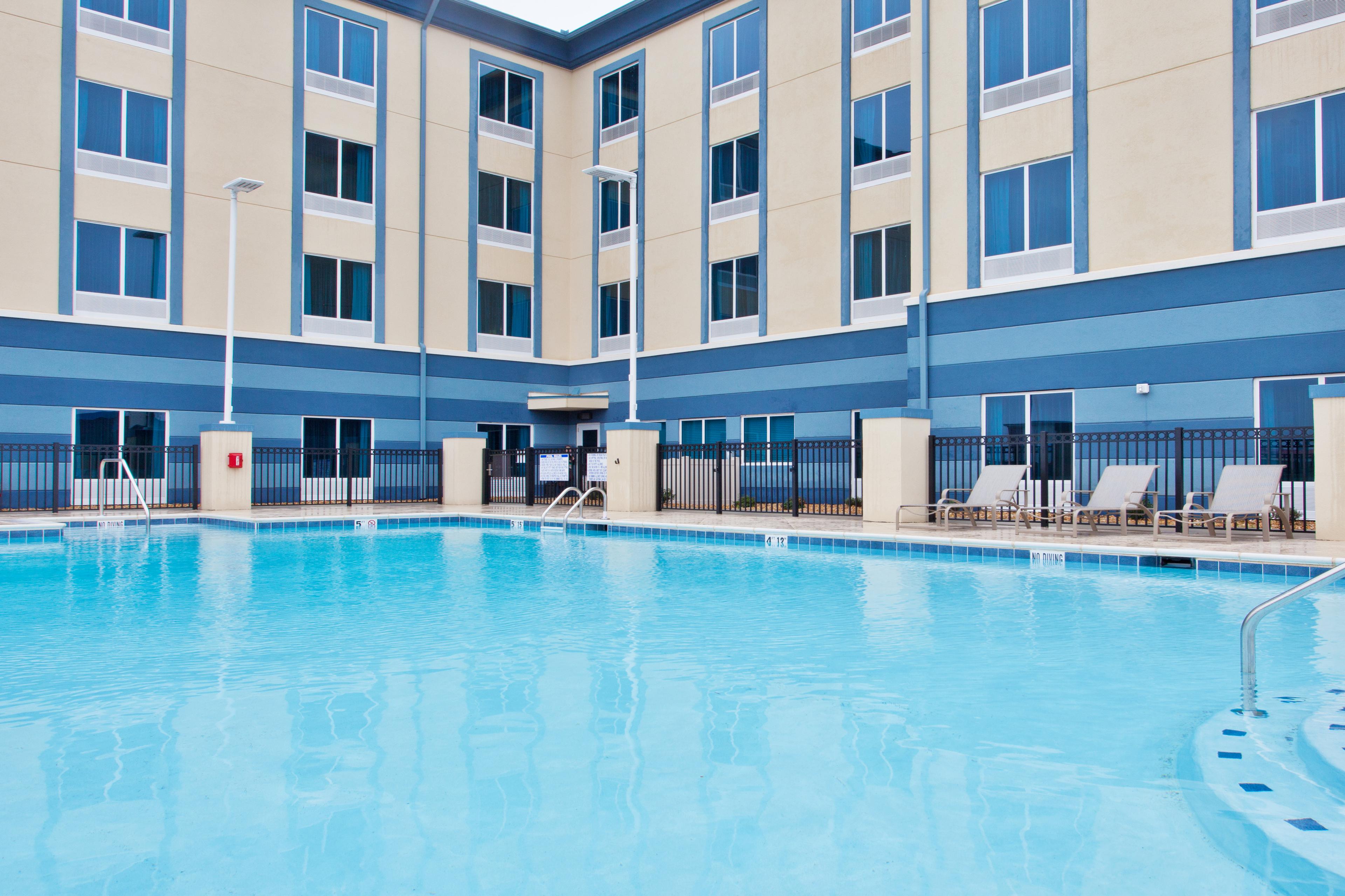 HOLIDAY INN EXP STES WARNER ROB BY