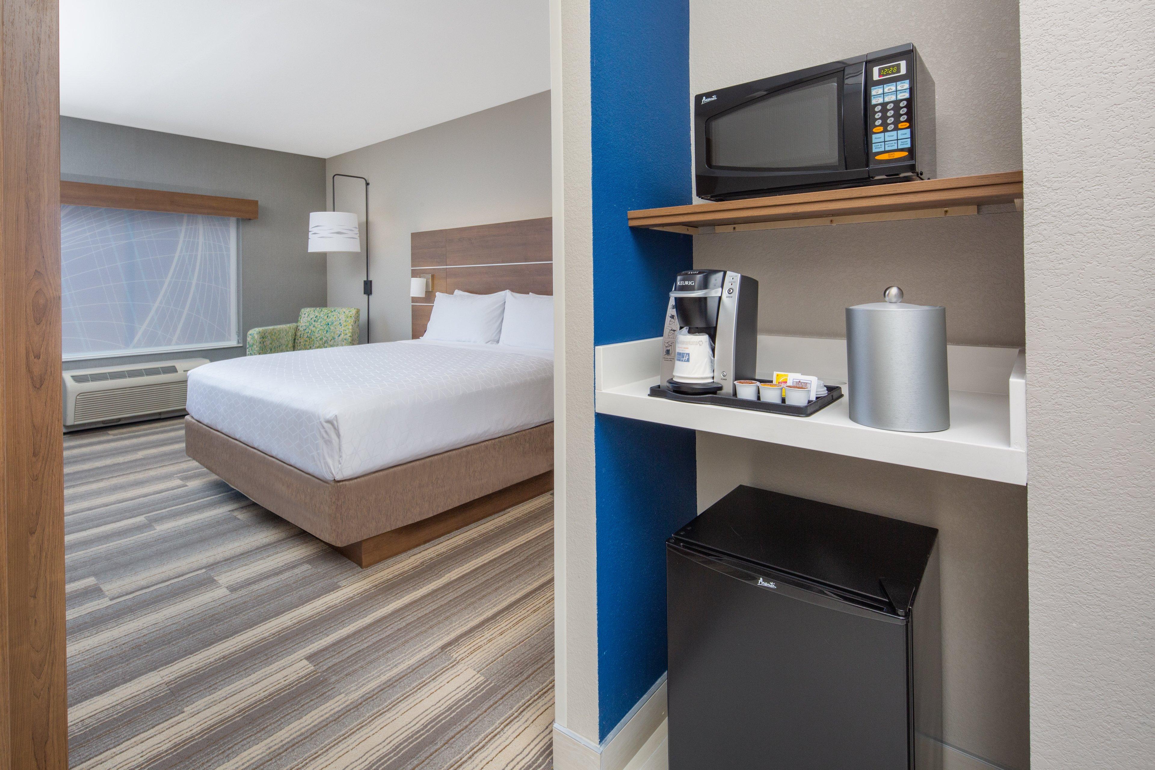 HOLIDAY INN EXP STES SURPRISE BY IH