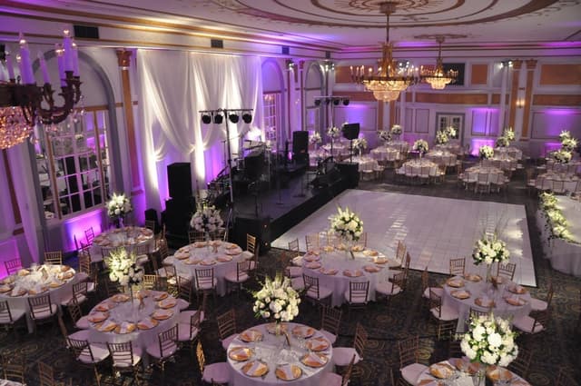 windsor-banquet-hall-montreal-windsor-ballroom-romantic-wedding-tables-dancefloor-purple-lighting.jpg