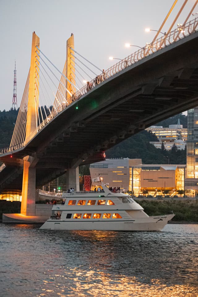 Crystal Dolphin going under Tilikum Crossing.jpg