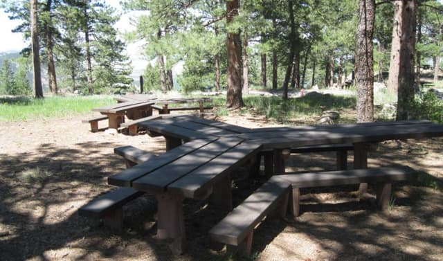 wood-shelter-outside-tables.jpg