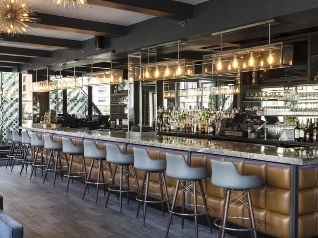 empire-hotel-new-york-city-rooftop-bar-and-stools_standard.jpg