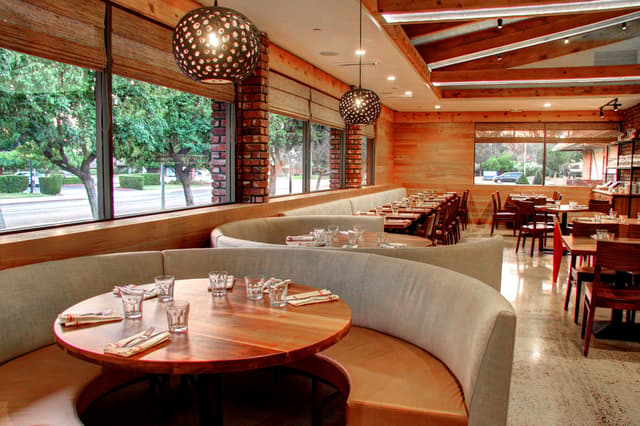 The Annex Kitchen interior, round booth.jpg