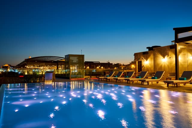 SUD Lisboa Terrazza - Pool and Bar at night.jpg