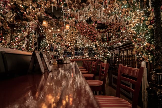 Ceiling-decorated-with-Christmas-Ornaments-at-Rolfs-Restaurant.jpg