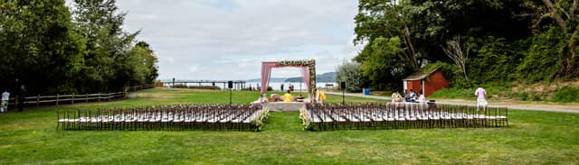 meadow-waterfront-wedding-ceremony-chairs-arch-des-moines-james-thomas-long-photography-header.jpg