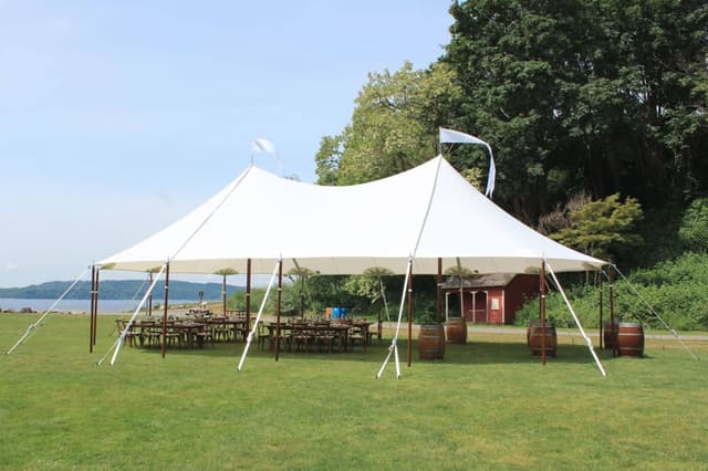 meadow-08-waterfront-party-reception-tent-with-tables-chairs.jpg