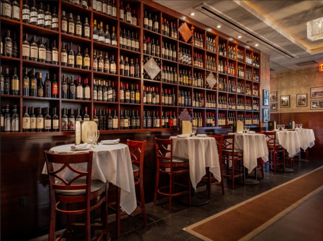 empire 54th west bar area wine wall.jpg