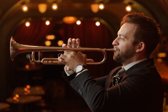 Benny Benack III Playing Trumpet at The Django.jpg