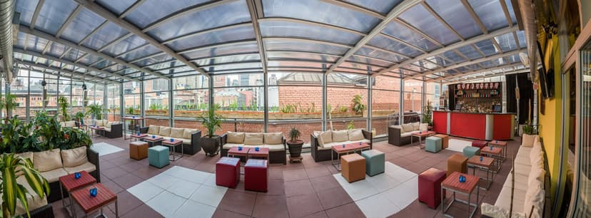 13 Best Rooftop Bars in NYC for Frozen Drinks, Skyline Views, and Mini Golf